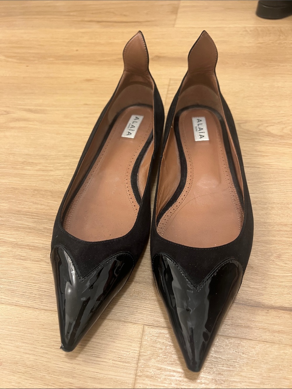 Alaia Black Pointed Toe Flats with Patent Cap